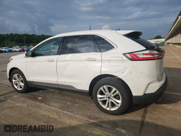 2020 Ford Edge SEL with VIN 2FMPK4J99LBB15305, listed as a Copart auction lot 59551475 with 61,025 mi miles and Salvage title. Bid and sale history available at DreamBid. Image 2.