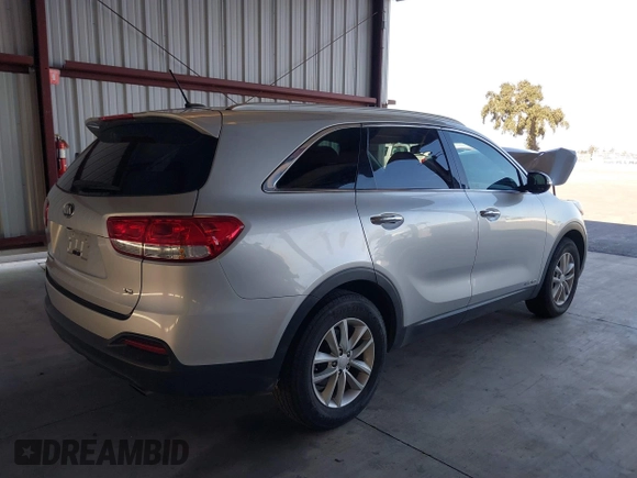 2018 Kia Sorento LX V6 with VIN 5XYPGDA50JG413205, listed as a IAAI auction lot 40331681 with 69,664 mi miles. Bid and sale history available at carsss.com. Image 4.