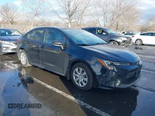2022 Toyota Corolla LE with VIN JTDEPMAE3NJ194494, listed as a IAAI auction lot 41210879 with 56,266 mi miles. Bid and sale history available at carsss.com. Image 1.