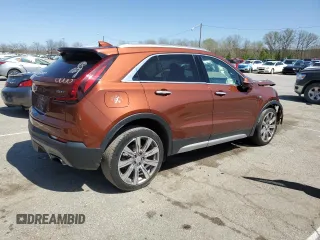 2019 Cadillac XT4 AWD Premium Luxury with VIN 1GYFZDR42KF214298, listed as a Copart auction lot 52489875 with 63,338 mi miles and Salvage title. Bid and sale history available at DreamBid. Image 3.