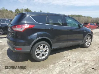 2013 Ford Escape SEL with VIN 1FMCU0HX4DUC48961, listed as a Copart auction lot 52630795 with 179,786 mi miles and Salvage Title. Bid and sale history available at DreamBid. Image 3.