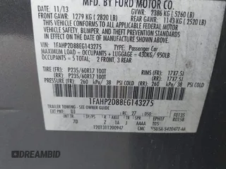 2014 Ford Taurus SE z VIN 1FAHP2D88EG143275, wystawiony jako IAAI lot #41801787 z przebiegiem 150 988 mil mil oraz . Historia ofert i sprzedaży dostępna na DreamBid. Obrazek 9.