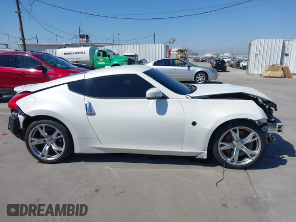 2009 Nissan 370Z Touring with VIN JN1AZ44E99M411252, listed as a IAAI auction lot 41969671 with 91,873 mi miles and . Bid and sale history available at DreamBid. Image 13.