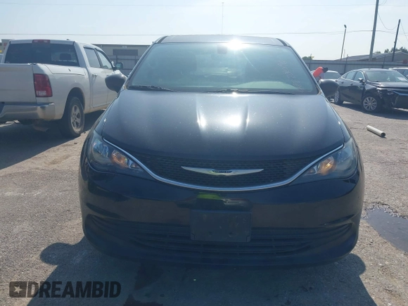 2017 Chrysler Pacifica Touring with VIN 2C4RC1DG6HR509717, listed as a IAAI auction lot 42228096 with 86,956 mi miles and . Bid and sale history available at DreamBid. Image 6.