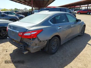 2016 Nissan Altima SR with VIN 1N4AL3AP9GC180232, listed as a IAAI auction lot 42125938 with 158,846 mi miles and . Bid and sale history available at carsss.com. Image 4.