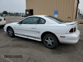 1997 Ford Mustang with VIN 1FALP4046VF180467, listed as a Copart auction lot 60754265 with 154,676 mi miles and Salvage title. Bid and sale history available at DreamBid. Image 2.