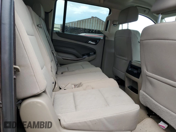 2020 Chevrolet Suburban LS z VIN 1GNSCGKC7LR218296, wystawiony jako Copart lot #61767105 z przebiegiem 118 405 mil mil oraz Szkoda całkowita • Salvage title. Historia ofert i sprzedaży dostępna na DreamBid. Obrazek 11.