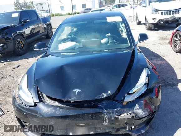 2018 Tesla Model 3 Long Range Battery with VIN 5YJ3E1EB9JF183920, listed as a IAAI auction lot 41657742 with 107,358 mi miles and . Bid and sale history available at DreamBid. Image 11.