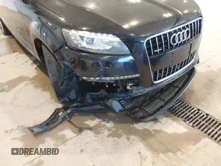 2013 Audi Q7 3.0T Premium Plus with VIN WA1LGAFE8DD003853, listed as a IAAI auction lot 40675011 with 104,517 mi miles. Bid and sale history available at carsss.com. Image 6.