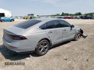 2024 Honda Accord EX-L with VIN 1HGCY2F68RA017005, listed as a Copart auction lot 59007135 with 6,696 mi miles and Salvage title. Bid and sale history available at DreamBid. Image 3.