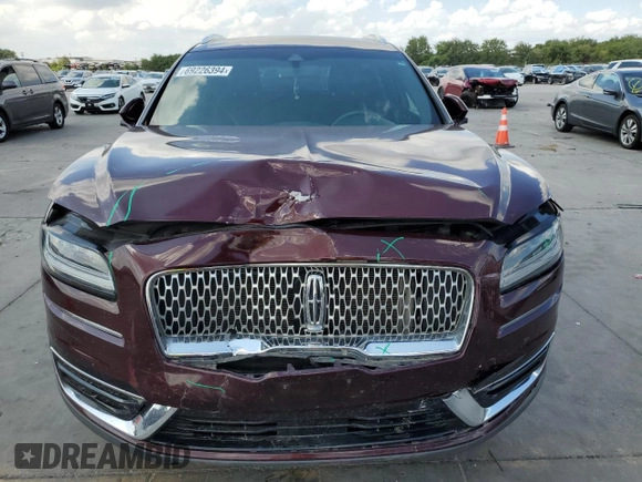 2019 Lincoln Nautilus Standard z VIN 2LMPJ8J96KBL19699, wystawiony jako Copart lot #69226394 z przebiegiem Nie podano mil oraz Szkoda całkowita • Salvage title. Historia ofert i sprzedaży dostępna na DreamBid. Obrazek 5.