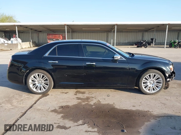 2011 Chrysler 300 with VIN 2C3CA6CT8BH595198, listed as a IAAI auction lot 41983417 with 182,067 mi miles. Bid and sale history available at carsss.com. Image 14.