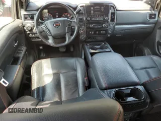 2020 Nissan Titan SL z VIN 1N6AA1ED8LN509339, wystawiony jako Copart lot #54925325 z przebiegiem 88 310 mil mil oraz Szkody całkowita. Historia ofert i sprzedaży dostępna na DreamBid. Obrazek 8.