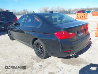 2015 BMW 3 Series 328i with VIN WBA3A5C58FF609161, listed as a IAAI auction lot 41162704 with 117,190 mi miles. Bid and sale history available at carsss.com. Image 3.