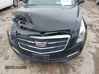 2018 Cadillac ATS RWD z VIN 1G6AA5RX7J0183805, wystawiony jako IAAI lot #41398076 z przebiegiem 103 784 mil mil oraz . Historia ofert i sprzedaży dostępna na DreamBid. Obrazek 18.