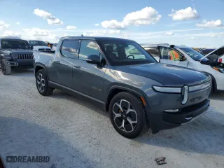 2022 Rivian R1T Adventure Package with VIN 7FCTGAAA2NN007543, listed as a Copart auction lot 77356644 with 0 mi miles and Non Repairable. Bid and sale history available at carsss.com. Image 4.