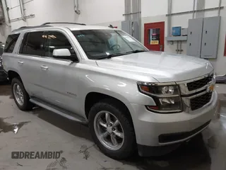 2015 Chevrolet Tahoe LT z VIN 1GNSKBKC7FR255956, wystawiony jako IAAI lot #42310560 z przebiegiem 215 968 mil mil oraz . Historia ofert i sprzedaży dostępna na DreamBid. Obrazek 1.