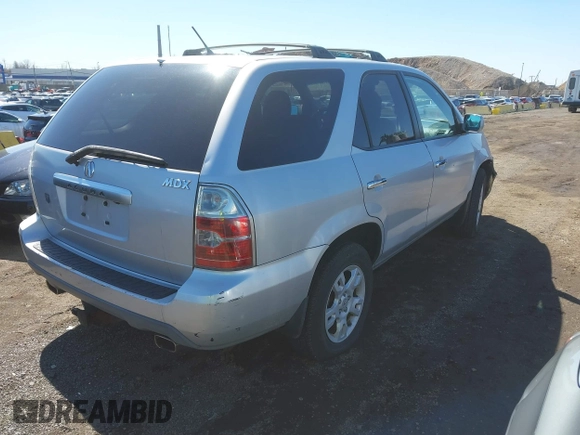 2004 Acura MDX Touring Pkg RES w/Nav with VIN 2HNYD189X4H523022, listed as a IAAI auction lot 41804292 with 165,586 mi miles. Bid and sale history available at carsss.com. Image 4.