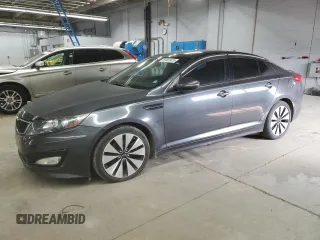 2011 Kia Optima SX z VIN KNAGR4A63B5161637, wystawiony jako Copart lot #59403425 z przebiegiem 129 863 mil mil oraz Czysty tytuł • Clean title. Historia ofert i sprzedaży dostępna na DreamBid. Obrazek 1.