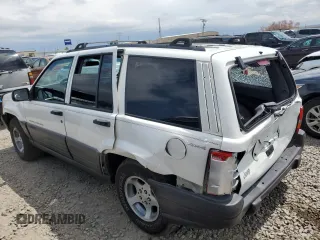 1998 Jeep Grand Cherokee Laredo with VIN 1J4GZ58S4WC244954, listed as a Copart auction lot 55731465 with 205,766 mi miles and Salvage title. Bid and sale history available at DreamBid. Image 2.