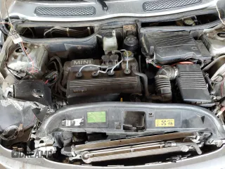 2004 MINI Hardtop with VIN WMWRC33404TJ58046, listed as a Copart auction lot 46358625 with 140,934 mi miles and Salvage Title. Bid and sale history available at DreamBid. Image 12.