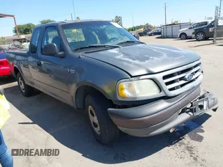 2002 Ford F-150 XL with VIN 1FTRX17232NA76530, listed as a IAAI auction lot 42681152 with 324,029 mi miles and . Bid and sale history available at DreamBid. Image 1.
