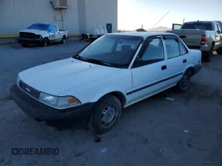 1990 Toyota Corolla z VIN 1NXAE94A9LZ084244, wystawiony jako Copart lot #41419155 z przebiegiem 221 586 mil mil oraz Czysty tytuł • Clean title. Historia ofert i sprzedaży dostępna na DreamBid. Obrazek 1.