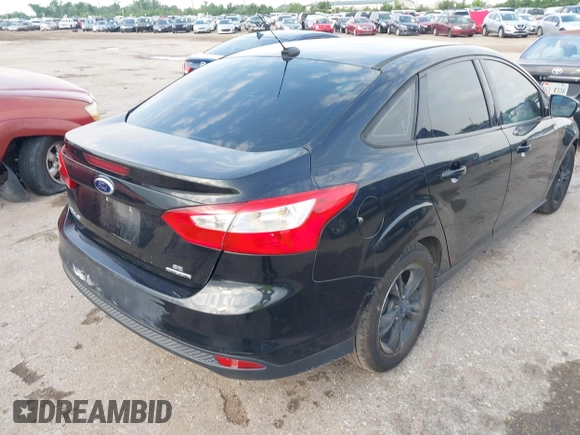2014 Ford Focus SE with VIN 1FADP3F21EL157488, listed as a IAAI auction lot 42120325 with 198,658 mi miles and . Bid and sale history available at DreamBid. Image 4.