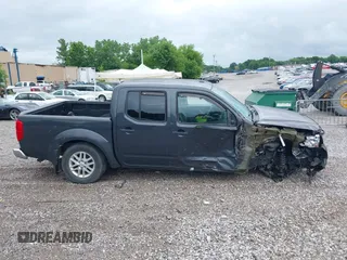 2015 Nissan Frontier SL with VIN 1N6AD0EV1FN764719, listed as a IAAI auction lot 42512771 with 104,572 mi miles and . Bid and sale history available at DreamBid. Image 14.