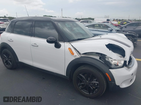 2012 MINI Countryman z VIN WMWZB3C56CWM04087, wystawiony jako IAAI lot #42180040 z przebiegiem 37 789 mil mil oraz . Historia ofert i sprzedaży dostępna na DreamBid. Obrazek 1.