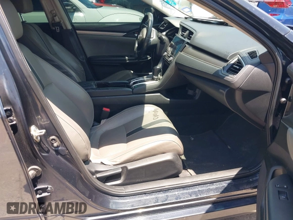 2017 Honda Civic EX-L with VIN 2HGFC1F73HH650011, listed as a IAAI auction lot 42459621 with 142,130 mi miles and . Bid and sale history available at DreamBid. Image 5.