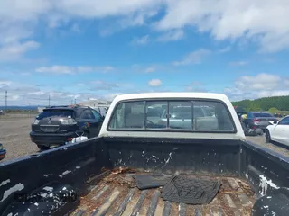 1993 Toyota T100 z VIN JT4VD20C1P0010434, wystawiony jako IAAI lot #42270410 z przebiegiem 263 632 mil mil oraz . Historia ofert i sprzedaży dostępna na DreamBid. Obrazek 8.