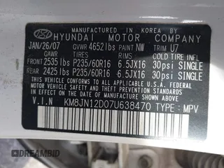 2007 Hyundai Tucson SE with VIN KM8JN12D07U638470, listed as a IAAI auction lot 41464634 with 203,283 mi miles. Bid and sale history available at carsss.com. Image 9.