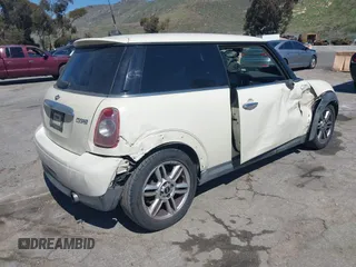 2011 MINI Hardtop with VIN WMWSU3C53BTX97140, listed as a IAAI auction lot 41861648 with 111,899 mi miles and . Bid and sale history available at DreamBid. Image 4.