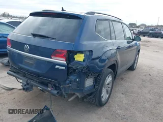 2021 Volkswagen Atlas SE z VIN 1V2JR2CA3MC555490, wystawiony jako IAAI lot #41286240 z przebiegiem 89 435 mil mil oraz . Historia ofert i sprzedaży dostępna na DreamBid. Obrazek 4.