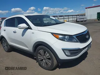 2014 Kia Sportage EX z VIN KNDPCCACXE7618991, wystawiony jako IAAI lot #42413938 z przebiegiem 204 494 mil mil oraz . Historia ofert i sprzedaży dostępna na DreamBid. Obrazek 1.