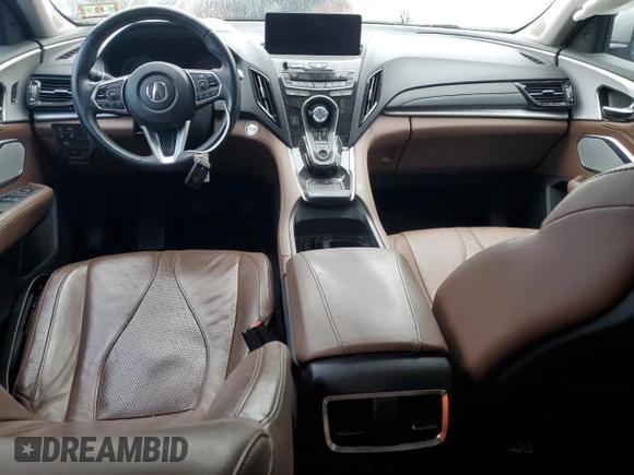 2019 Acura RDX Technology с VIN 5J8TC2H57KL015064, выставлен на аукционе Copart как лот 54500695 с пробегом Не указан миль и Списание • Salvage title. История ставок и продаж доступна на DreamBid. Изображение 8.