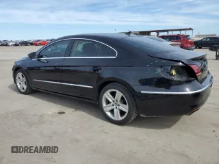 2014 Volkswagen CC Sport with VIN WVWBN7AN7EE521448, listed as a Copart auction lot 46329685 with 169,955 mi miles and Salvage Title. Bid and sale history available at carsss.com. Image 2.