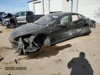 2015 Tesla Model S 85D with VIN 5YJSA1H40FF097620, listed as a Copart auction lot 87309094 with Not Provided miles and Salvage Title. Bid and sale history available at carsss.com. Image 1.