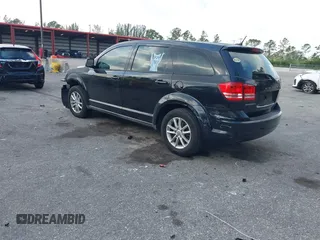 2013 Dodge Journey SE with VIN 3C4PDCAB0DT710609, listed as a IAAI auction lot 41763431 with 145,851 mi miles and . Bid and sale history available at DreamBid. Image 3.