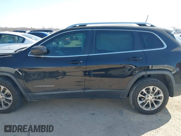 2019 Jeep Cherokee Latitude Plus with VIN 1C4PJLLB4KD312411, listed as a IAAI auction lot 41677041 with 82,802 mi miles and . Bid and sale history available at DreamBid. Image 14.