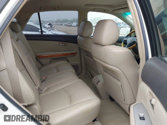 2007 Lexus RX 400h z VIN JTJGW31U572003651, wystawiony jako IAAI lot #42163515 z przebiegiem 358 648 mil mil oraz . Historia ofert i sprzedaży dostępna na DreamBid. Obrazek 8.