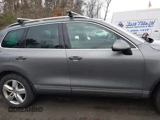 2013 Volkswagen Touareg Lux with VIN WVGEF9BP0DD005082, listed as a IAAI auction lot 41667026 with 140,148 mi miles and . Bid and sale history available at DreamBid. Image 14.