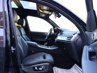 2021 BMW X5 xDrive45e with VIN 5UXTA6C04M9H41005, listed as a Copart auction lot 57778635 with 20,683 mi miles and Clean title. Bid and sale history available at DreamBid. Image 5.