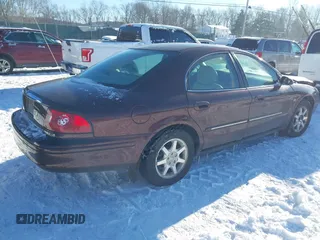2000 Mercury Sable LS Premium with VIN 1MEFM55S3YA616365, listed as a IAAI auction lot 41341223 with 167,533 mi miles. Bid and sale history available at carsss.com. Image 4.