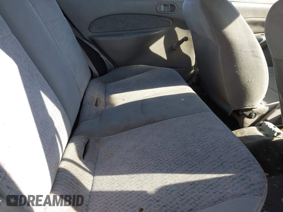 1997 Ford Escort LX with VIN 1FALP13PXVW263906, listed as a IAAI auction lot 41496083 with Not Provided miles and . Bid and sale history available at DreamBid. Image 8.