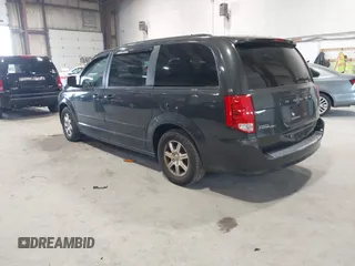 2012 Dodge Grand Caravan SXT with VIN 2C4RDGCG4CR224850, listed as a IAAI auction lot 42070300 with 177,982 mi miles and . Bid and sale history available at DreamBid. Image 3.