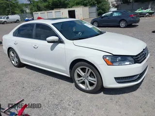 2014 Volkswagen Passat SE with VIN 1VWBT7A33EC032493, listed as a IAAI auction lot 42662400 with 122,601 mi miles and . Bid and sale history available at DreamBid. Image 1.