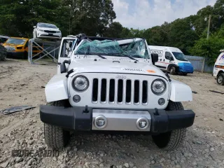 2018 Jeep Wrangler JK Unlimited Sahara with VIN 1C4BJWEG7JL856975, listed as a Copart auction lot 59562484 with 101,419 mi miles and Salvage Title. Bid and sale history available at carsss.com. Image 5.