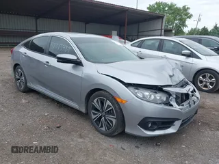 2017 Honda Civic EX-L z VIN 19XFC1F72HE017784, wystawiony jako IAAI lot #42343789 z przebiegiem 146 487 mil mil oraz . Historia ofert i sprzedaży dostępna na DreamBid. Obrazek 1.